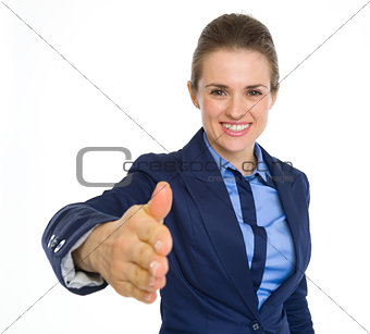 Happy business woman stretching hand for handshake