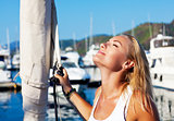 Woman tanning on luxury yacht