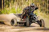 ATV racer takes a turn during a race. 
