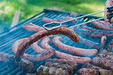 Sausages being grilled