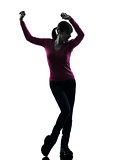 woman happy dancing silhouette
