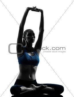 woman exercising yoga meditating sitting stretching