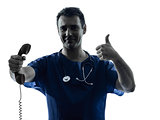 doctor man silhouette holding phone thumb up gesture 