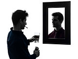 man in front of his mirror silhouette