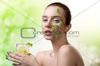 pretty woman with fresh make-up and cold mojito