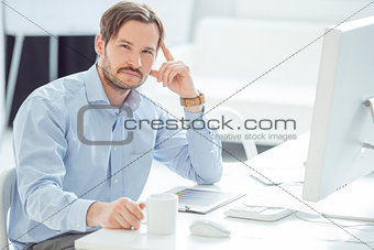 Handsome Businessman working at his desk