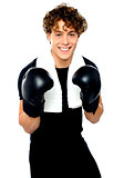 Boxer boy in sports outfit ready to punch you