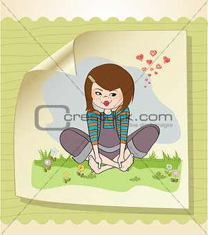 romantic girl sitting barefoot in the grass