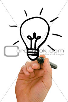 Male hand drawing light bulb on virtual screen