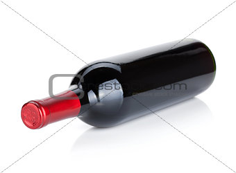 Lying red wine bottle