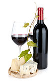 Red wine bottle, glasses and cheese