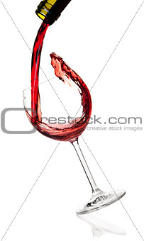 Wine collection -  Red wine is poured into a falling glass