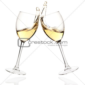 Clink glasses with white wine