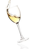 Splashing white wine in a falling glass