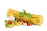 Italian pasta, tomatoes, basil and garlic