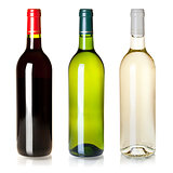 Three closed wine bottles without labels