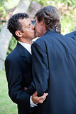 Gay Couple Kiss at Wedding
