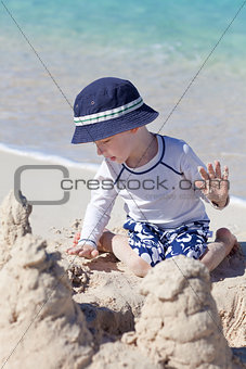 little kid at the beach