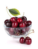Ripe cherries in a glass bowl