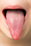 Human tongue protruding out