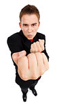Agressive young man showing fist