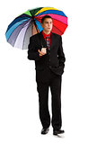 Casual man walking with colorful umbrella