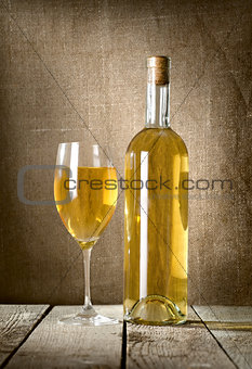 Dessert wine and glass on the canvas