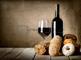Red wine and assortment of bread