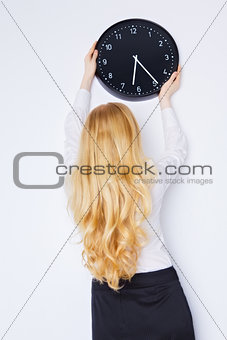 Office Girl Sets the Clock
