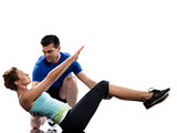 man aerobic trainer positioning woman  Workout
