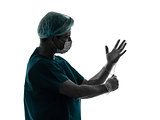 doctor surgeon man portrait with face mask latex gloves silhouet