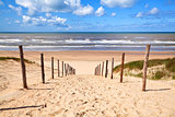 path to sandy beach by North sea
