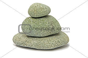 Pyramid of pebbles isolated on white