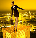 worried business woman on gold tower and town