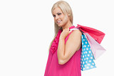 Smiling blonde holding shopping bags