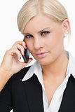 Beautiful businesswoman using her mobile