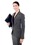 Corporate woman posing with clipboard