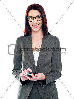 Female assistant using touch screen phone