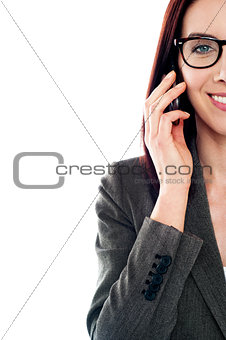 Cropped image of a lady using a mobile phone