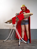 Mexican wrestler ironing his tights