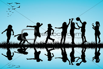Group of children silhouettes playing outdoor