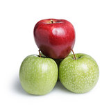 one red and three green apples in piramid