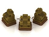 Three old gold-plated cash registers