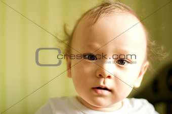 Cute baby boy with funny hair