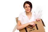 Business woman in a cardboard box