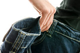 Detail of woman skinny waist in too large old jeans
