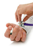 Holding stethoscope on cigarette addict hand