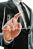 Businessman's hand pointing at graph