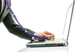 Side view of male hand checking laptop with stethoscope