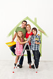 Happy family redecorating their home